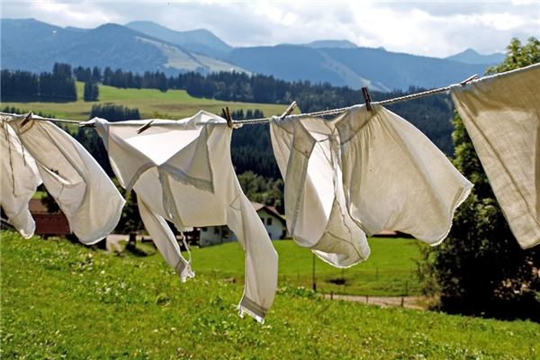 Dreaming of tattered clothes