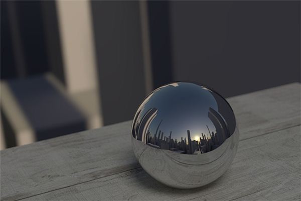 What does it mean to dream of holding a spherical object in your hand?