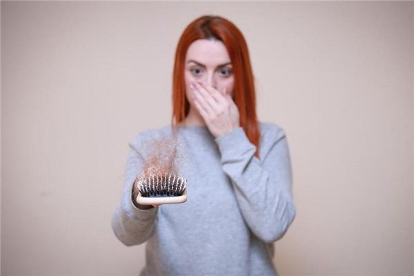 I dreamed that I was combing my hair and my hair was falling out.