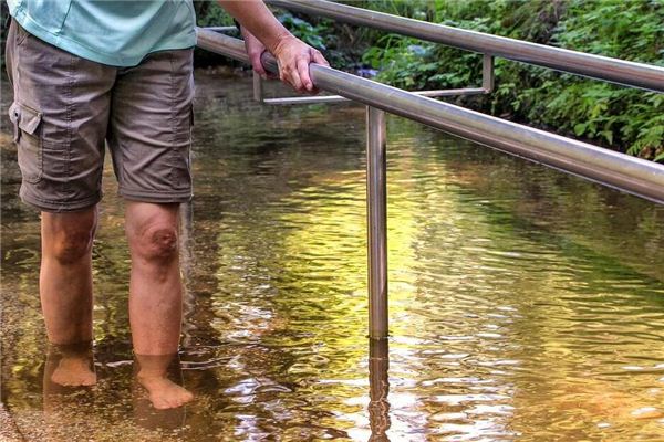 I dreamed of crossing a shallow river barefoot.