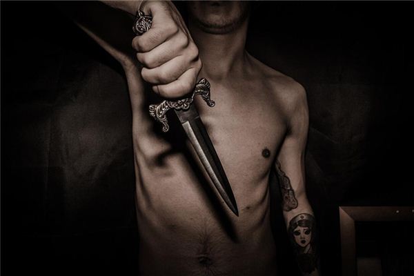 I dreamed that someone stabbed me with a knife.
