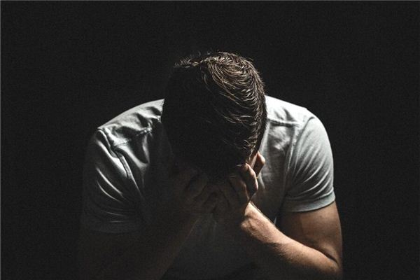 I dreamt that someone was kneeling in front of my bed and crying.