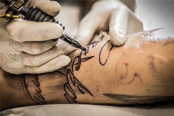 What does it mean to dream about having a tattoo?